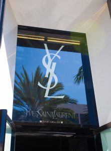 "Los Angeles, USA - October 04, 2012: Yves Saint Laurent store front located in Beverly Hills. Yves Saint Laurent or YSL is a luxury fashion house founded by Yves Saint Laurent and his partner, Pierre BergA. On June 21, 2012, it was announced that the brand would be renamed Saint Laurent Paris."